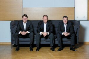 Die Intersport-Vorstände Hannes Rumer, Kim Roether und Jochen Schnell hoffen auf das Sportjahr 2016